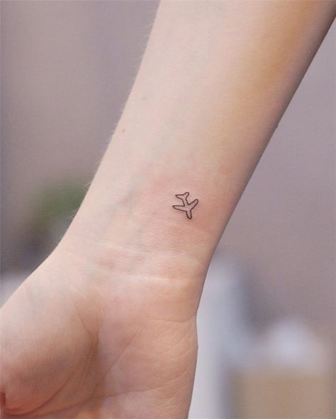 Tiny Airplane Tattoo Simple, Plane Wrist Tattoo, Fineline Airplane Tattoo, Propeller Plane Tattoo, Plane Outline Tattoo, Mini Plane Tattoo, Airplane Outline Tattoo, Mini Airplane Tattoo, Study Abroad Tattoo