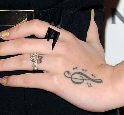 Cher Lloyd showing off her hand tattoos and rings Cher Lloyd Tattoos, Black Tattoo Ideas, Cher Lloyd, Black Tattoo, Henna Tattoos, Hand Tattoo, All Black Outfit, Henna Tattoo, Black Pumps