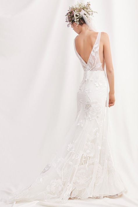 Honor by Willowby | 2019 Willowby Collection | Love Her Madly Collection | When you want an incredible gown you can wear (without it wearing you), there’s our fit-and-flare Honor. Crafted of unlined airy tulle with overlaid ivory floral lace, it’s just that easy to fall for | Sleeveless Wedding Dress | Fit and Flare Wedding Dress | V neck Wedding Dress | Low Back Wedding Dress | Floral Motif Wedding Dress | Romantic Wedding Dress | #willowby #watters #aandbebridalshop Willowby By Watters, By Watters, Western Wedding Dresses, Fit And Flare Wedding Dress, V Neck Wedding Dress, Designer Bridal Gowns, Fitted Wedding Dress, Classic Wedding Dress, Wedding Dresses Romantic