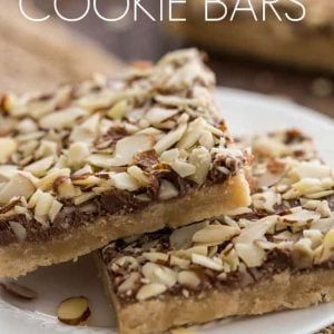 Almond Roca Cookie Bars | The Recipe Critic Slow Cooker Mongolian Beef, Cowboy Cookie Recipe, Microwave Dessert, Almond Roca, Cookie Base, The Recipe Critic, Recipe Critic, Dessert Bar Recipe, Eat Cookies