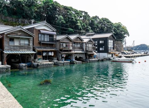 One of the coolest experiences we had on our latest trip to Japan was visiting the tiny coastal town of Ine and seeing all of the Funaya (boat houses) that are clad in traditional yakisugi. Crystal clear water, amazing fishing and a boat garage in every home - the people of Ine have life figured out! #yakisugi #shousugiban #japan Japanese Coastal Town, Japanese Seaside Town, Japanese Modern Architecture, Acnh Coastal, Charred Wood Siding, Boat Garage, Japan Beach, Modern Japanese Architecture, Character Moodboard