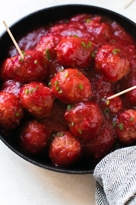 These easy to make Crockpot Cranberry Meatballs are the perfect balance of sweet and tangy! Made with cranberry sauce, chili sauce and store bought frozen meatballs. They are a delicious appetizer for holiday parties and pot lucks! Meatballs With Cranberry Sauce, Best Crockpot Meatballs, Easy Crockpot Meatballs, Crockpot Meatballs, Cranberry Meatballs, Meatball Appetizer Recipe, Leftover Cranberry Sauce, Homemade Sauce Recipes, Crock Pot Meatballs