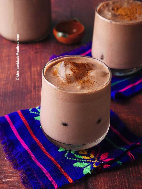 This iced Mexican chocolate is made using Mexican hot chocolate disks and it's a decadent treat to enjoy over ice cubes. Easy to make and needs just 4 Mexican Chocolate Drink Recipes, Mexican Hot Chocolate Cocktail, Mexican Hot Chocolate Fudge, Mexican Hot Chocolate Abuelita, Vegan Birria Tacos, Vegan Mexican Hot Chocolate, Iced Hot Chocolate, Mexican Drink Recipes, Vegan Beverages