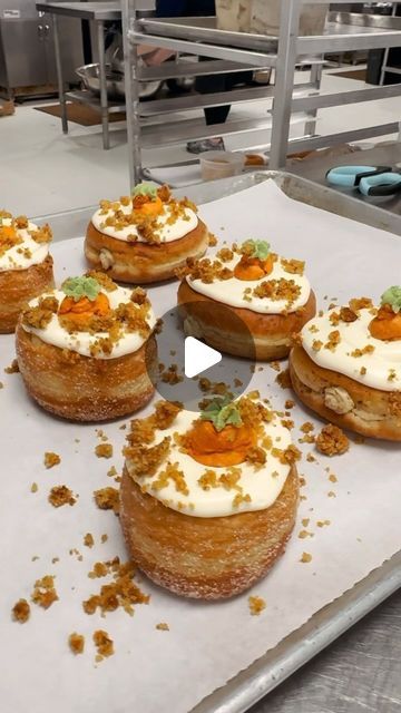 Five Daughters Bakery on Instagram: "CARROT CAKE ANYONE!? 😍🥕🍩  This #100layer donut is infused with carrot cake buttercream, topped with our cream cheese glaze, sprinkled with housemade carrot cake crumbles and garnished with a buttercream carrot…  It’s almost like you can taste it! 😉 see ya soon?   Tag someone who loves donuts! 🫶🏽" Carrot Cake Decoration, Five Daughters Bakery, Cream Cheese Glaze, Creative Cake Decorating, Cake Slice, Carrot Cake, Creative Cakes, Donuts, Cream Cheese