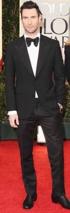 Adam Levine, tuxedo by Tom Ford.  Wide peak lapels, oversize bow tie. Single-breasted Flat Front Tuxedo, Tom Ford Velvet Suit, Tom Ford Double Breasted Suit, Tom Ford Bow Tie, Tom Ford Black Suit, Dinner Jacket, Black Tuxedo, Adam Levine, Famous Men