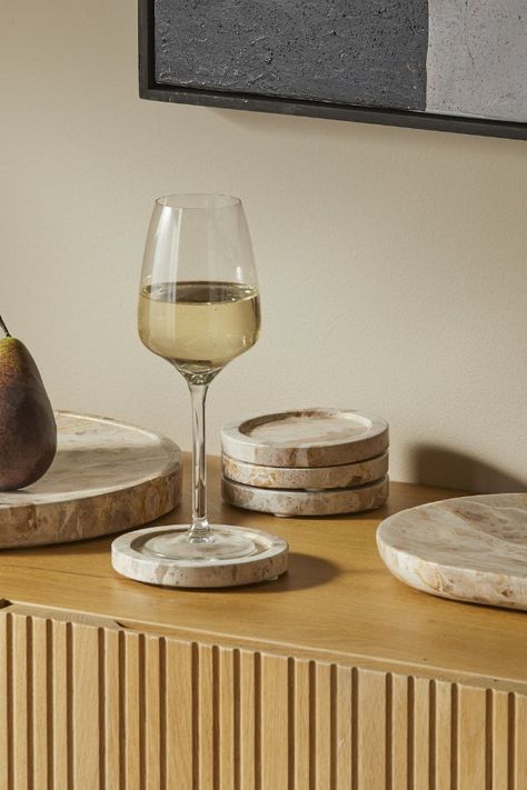 This Carprinie Coaster Set/4 is both stylish and practical.Crafted from marble, they display a beautiful white and beige appearance.With circular silhouettes and ribbed edging, they’re statement pieces! Place under hot or cold drinks to protect your tabletops from heat damage.Wipe clean with a damp cloth. Measurements: 11x11x2cm Material: Marble Style Code: AECSGD001 Coasters Marble, Cloth Measurements, Garden Vases, Photo Frame Gift, Marble Tray, Marble Coasters, White And Beige, Dining Lighting, Marble Coffee Table