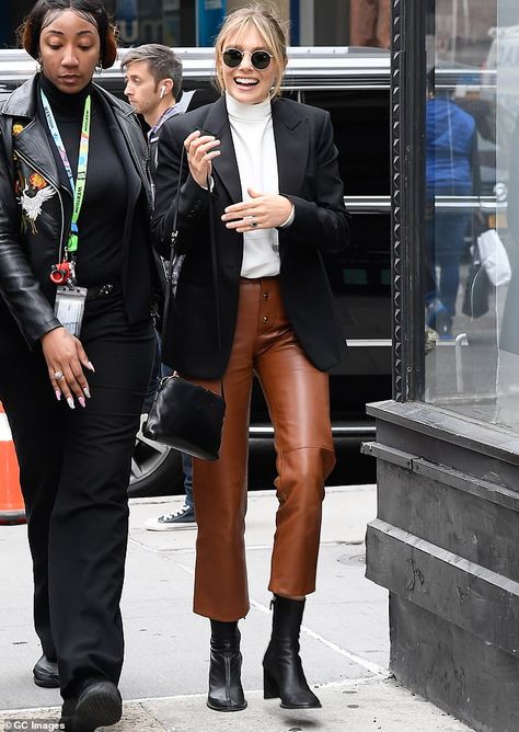 Elizabeth Olsen cuts a chic look as she covers up in a turtleneck and  leather pants at SiriusXM | Daily Mail Online Look Casual Otoño, Brown Leather Pants Outfit, Leather Trousers Outfit, Berlin Street Style, Brown Leather Pants, Leather Leggings Outfit, Leather Pants Outfit, Fashion Queen, High Neck Blouse