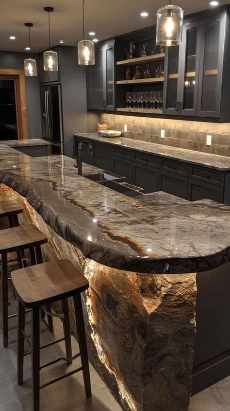 Luxurious modern kitchen with dark cabinets, marble countertop, stylish pendant lights, and high-end appliances Dark Marble Countertops, Extended Kitchen, Kitchen With Dark Cabinets, Dark Marble, Dark Countertops, Marble Countertop, Dark Cabinets, Casual Dining, Marble Countertops