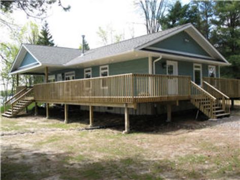 Wrap Around Porch Double Wide, Double Wide With Basement, Double Wide With Wrap Around Porch, Wrap Around Deck Ideas, Doublewide Makeover, Porch On Double Wide, Double Wide Porch Ideas, Double Wide Remodel Exterior, Double Wide Porch