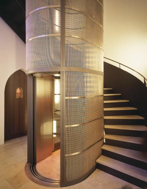 Lift And Staircase Design, Cool Elevator Design, Staircase Lift Design, Stairs Around Elevator, Glass Lift Design, Glass Elevator Design, Glass Elevator Design Interiors, Home Lift Design, Elevator In House