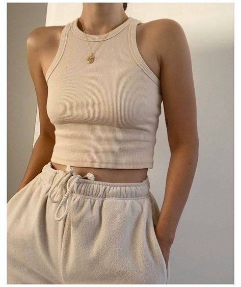 Casual Cropped Beige Tank Top, Casual Beige Cropped Tank Top, Beige Ribbed Crop Top Tank, Ribbed Cropped Tank Top In Beige, Casual Ribbed Crop Top For Workout, Casual Solid Color Crop Top Halter, Trendy Ribbed Crop Top With Racerback, Summer Beige Ribbed Crop Top, Summer Ribbed Beige Crop Top