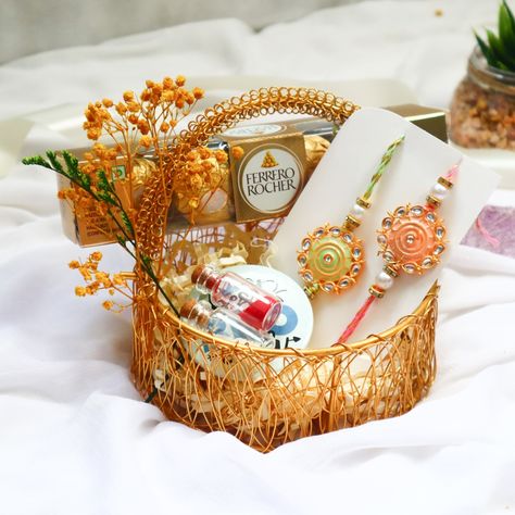 Bro-licious Basket for Raksha Bandhan ❤❤ Celebrate the bond of love with our exclusive Raksha Bandhan Gift Hamper! 🎁✨ This beautifully curated set is perfect for sending to your brother and includes everything to make the occasion special ✨ Handcrafted Rakhi 1 piece 🍫 Ferrero Rocher Chocolates 🩸 Tilak and Chawal in Cork Bottle 🌼 Decorative Metal Basket 🧲 Fridge Magnet Show your brother how much you care with this thoughtfully crafted gift set. Order now and make this Raksha Bandhan unforge... Raksha Bandhan Rakhi, Rakhi Bracelet, Raksha Bandhan Gifts, Ferrero Rocher Chocolates, Rakhi Gift, Cork Bottle, Brother And Sister Love, Hamper Gift, Cadbury Dairy Milk