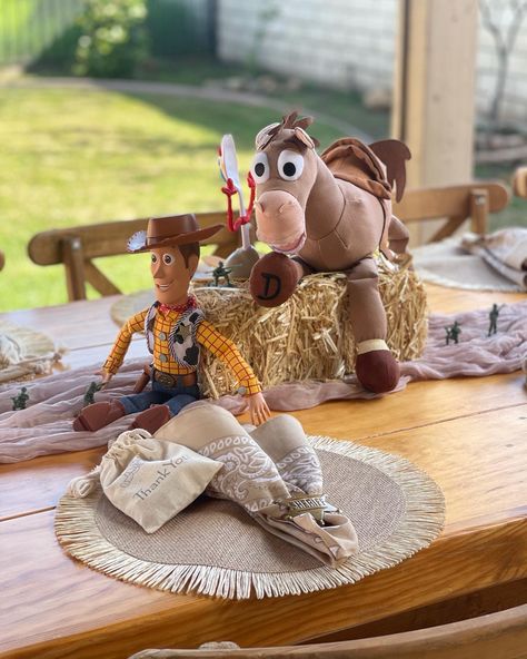 Woody Birthday Party Centerpieces, First Rodeo Birthday Boy Toy Story, Woody Theme First Birthday, Toy Story Birthday Party Treats, Toy Story Centerpieces Ideas Table Decorations, First Round Up Birthday Toy Story, Muted Toy Story Party, Toy Story Baby Shower Games, Toy Story Party Centerpieces