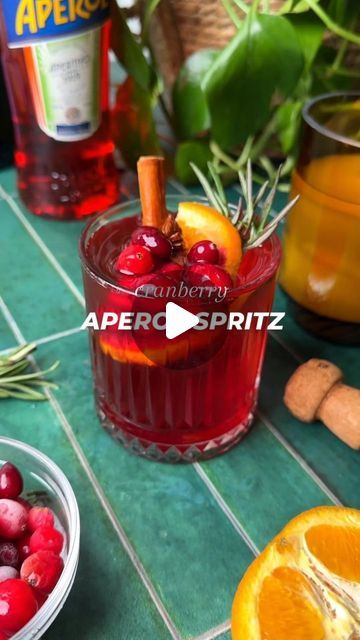 Sarah Bond on Instagram: "Cranberry Aperol Sptriz! Drop in those spiced cranberry ice cubes, top with Aperol and bubbly, and watch the magic happen. It’s the ultimate holiday sipper!  Comment 👉 "spritz" and I'll send you the recipe!  (Tag a friend who you're going to make this with! )  https://www.liveeatlearn.com/cranberry-aperol-spritz/  #aperolspritz #aperol #wintercocktail #fallcocktail" Cranberry Aperol Spritz Recipe, Aperol Ice Cubes, Aperol Spritz Ice Cubes, Cranberry Ice Cubes Holiday Drinks, Cranberry Aperol Spritz, Cranberry Ice Cubes, Cranberry Ice, Aperol Spritz Recipe, Spritz Recipe