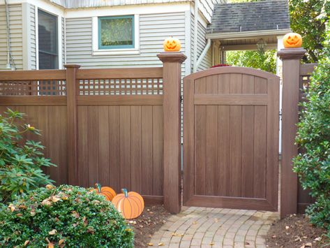 V3215SQ-6 6' Tongue & Groove Vinyl Privacy fence with Square Lattice top and Majestic™ 8" x 8" end posts in Grand Illusions Vinyl Woodbond Walnut Grain (W103). Also shown is VBG2 Solid T Crowned Walk Gate. Privacy Fence With Gate, Lattice Top Fence, Wood Grain Vinyl Fence, Cheap Privacy Fence, Fence With Lattice Top, Outdoor Chalkboard, Backyard Gates, White Vinyl Fence, Garden Gates And Fencing