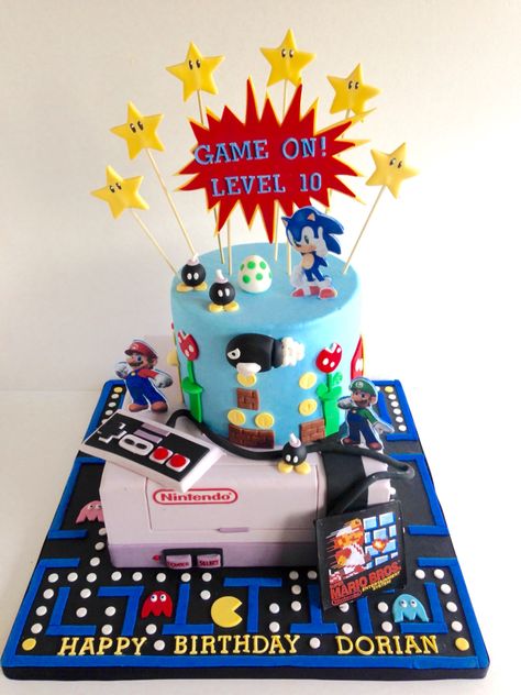 Video game cake                                                                                                                                                                                 More Video Gamer Cake, Arcade Themed Birthday Cake, Arcade Birthday Party Cake, Arcade Cake Ideas, Arcade Game Cake, Arcade Birthday Cake, Video Game Birthday Party Cake, Video Game Theme Cake, Video Games Cake