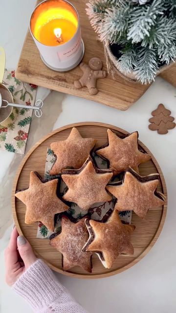 Yukiko Tanzi on Instagram: "Puff pastry nutella stars 🌟 Super easy Christmas recipe 🥰 Ingredients 1 sheet Puff pastry 1/3 cup Nutella spread or similar 2-3 tbsp cinnamon sugar * Egg wash (1 egg + 1 tsp milk) *cinnamon sugar: combine 100g (1/2 cup) caster sugar + 1 tbsp cinnamon powder. Instructions: Spread Nutella over half of the puff pastry sheet and fold the other half over. Cut out shapes using a large cookie cutter. Brush with egg wash and sprinkle with cinnamon sugar. Bake into pr Puff Pastry Nutella, Christmas Pastries, Nutella Spread, Christmas Recipes Easy, Apple Dessert, Christmas Recipe, Christmas Food Dinner, Cinnamon Powder, Cut Out Shapes