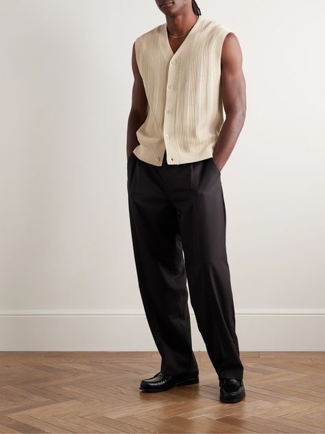 NN07's ribbed 'Reece 6600' sweater vest is crafted from breathable organic cotton and knitted with tactile purl stitches along the edges. It's designed for a slightly loose fit and works well buttoned up as a tank top or layered over a T-shirt. Lower Impact Materials. This product is made using at least 50% lower-impact materials or ingredients. Find out more about our Consciously Crafted criteria here.