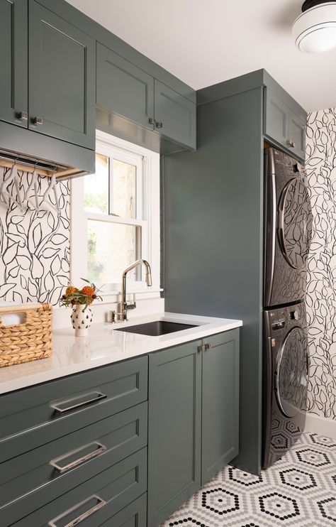 The 10 Most Popular Laundry Rooms So Far in 2022 Laundry Room Cabinet Colors, Washer And Dryer Stand, Stacked Laundry, Gray Stained Wood, Transitional Laundry Room, Green Laundry, Black Floor Tiles, Laundry Cabinets, Flat Panel Cabinets