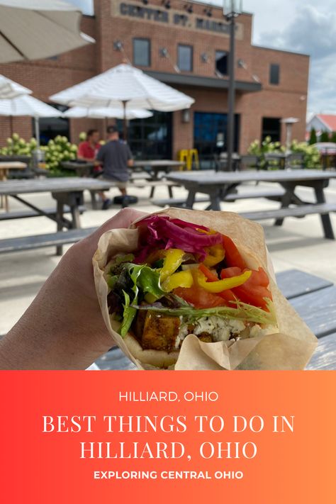 Discover the charm of Hilliard, Ohio with this list of must-do activities! From exploring the trails of Homestead Metro Park to enjoying in local flavors at the Center Street Market, there's something for everyone! Bocce Court, Ohio Travel, Park Playground, Splash Pad, Fish Ponds, Street Market, Summer Concert, Nature Center, Covered Bridges