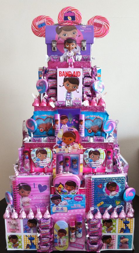 Doc Mcstuffins Party! Doc Mcstuffins Party Favors Dr Mcstuffins, Candy Tower, Doctor Mcstuffins, Homemade Gift Boxes, Tower Cake, Doc Mcstuffins Birthday Party, Doc Mcstuffins Party, Party Decoration Ideas, Doc Mcstuffins Birthday