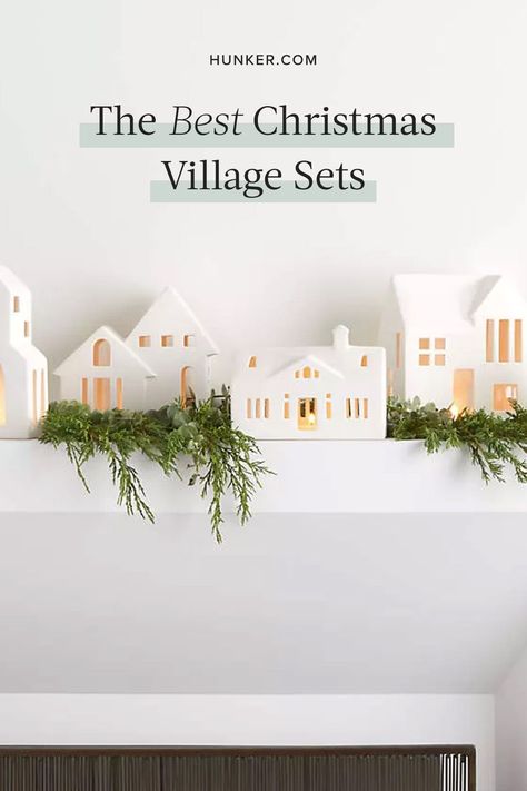 Whether you're looking for village pieces or unique additions to your current collection, here's a list of some of our favorite Christmas village sets. #hunkerhome #christmasvillage #christmasdecor #christmasdecorideas #holidaydecor Farmhouse Christmas Village Display, Diy White Houses Christmas, Christmas White Village Display, All White Christmas Village Display, White Village Christmas Houses Diy, All White Christmas Village, White House Christmas Village, White House Village Christmas, Christmas White House Village