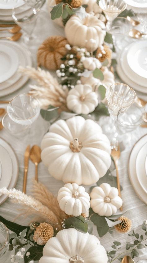 30+ Modern Thanksgiving Tablescapes To Elevate Your Celebration Thanksgiving Table Decor Elegant, Muted Fall Tablescapes, Thanksgiving Theme Wedding, Dining Buffet Decor Ideas Modern, Beige Thanksgiving Aesthetic, Silver And Gold Thanksgiving Table, 2024 Thanksgiving Trends, Pumpkin Tablescape Fall Decorating, Thanksgiving Decorations Table Setting Elegant