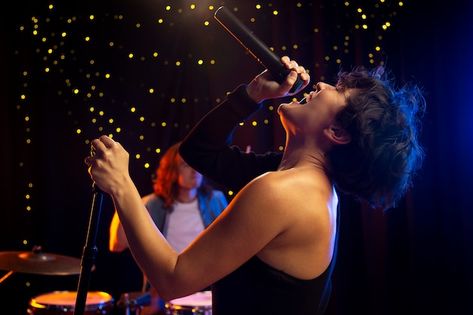 Medium shot talented singer performing | Premium Photo #Freepik #photo #singing #talent-show #music-band #band Singer Performing, Singing Talent, The Wedding Singer, Music Band, Premium Photo, 1 Million, Singing, Stock Photos, Concert