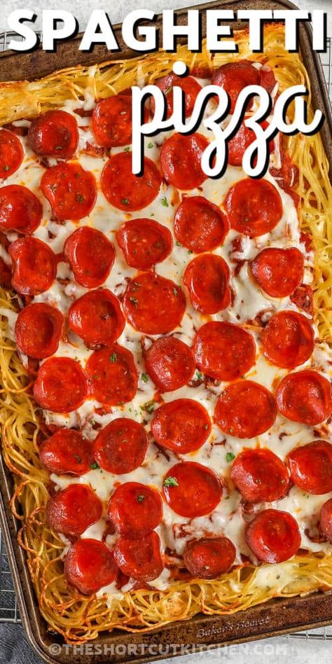 Spaghetti pizza in a sheet pan with writing Spaghetti Pizza Recipe, Baked Spaghetti Pizza, Crockpot Chicken Alfredo, Spaghetti Pizza, Crock Pot Lasagna Recipe, Crockpot Pasta Recipes, Spaghetti Pie, Pork Chop Recipes Baked, Chop Recipes