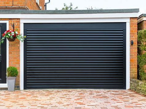 Automatic Roller Garage Doors | Everest Black Garage Door, Black Garage Doors, Carriage Garage Doors, Automatic Garage Door, Cottage Front Doors, Black Garage, Wooden Garage Doors, Sectional Garage Doors, Garage Door Types