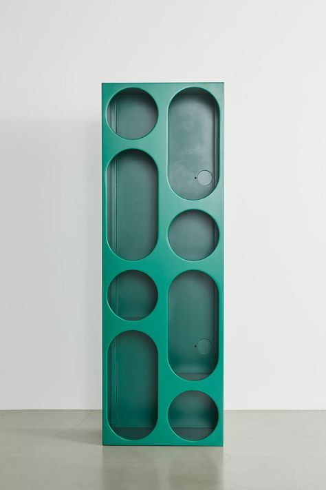 Create an artful display out of your collection of novels, trinkets, plants and more with this storage console. Features eight cubbies in alternating circular and ovular shapes with a duo of cutouts in the back panel to hide your cords. Its rectangular frame is so versatile, allowing you to display your console vertically or horizontally in your space. Available exclusively at Urban Outfitters. *Contains affiliate link that may earn commission at no additional cost to you. Geometric Furniture Design, Geometric Furniture, Bat Cave, Beautiful Home Gardens, Storage Console, Modern Bookshelf, 70s Decor, Decorative Cabinet, Simple Living Room