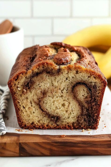 This Easy Cinnamon Swirl Banana Bread is perfectly moist with rich banana flavor and ribbons of cinnamon sugar swirled throughout for the ultimate treat! Banana Bread With Cinnamon Swirl, Banana Bread Swirl, Caramelized Banana Bread, Cinnamon Swirl Banana Bread Recipe, Banana Bread Recipe With Cinnamon, Banana Bread Recipe Cinnamon Swirl, Banana Bread Cinnamon Swirl, Banana Swirl Bread, Banana Cinnamon Swirl Bread