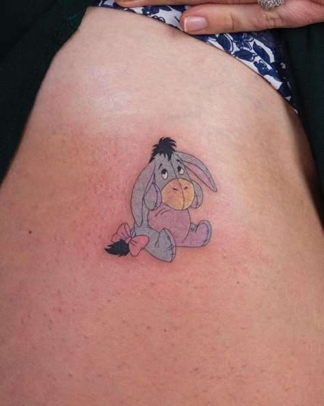 10 Best Eeyore Tattoo Ideas You'll Have To See To Believe! | Outsons | Men's Fashion Tips And Style Guides Eeyore Tattoo Ideas, Piglet Tattoo, Eeyore Tattoo, Mommy Daughter Tattoos, Winnie The Pooh Tattoos, Cartoon Character Tattoos, Bear Tattoo, Cartoon Tattoos, White Tattoo