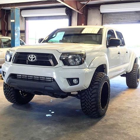 everythingtoyotas Owner: @longbed_stormtrooper '12 Tacoma • 3" Toytec Coils & AAL • 20x12 Fuel Mavericks • 33x12.5 Toyo MT's • Color Matched Grille & Bumper • BHLM & Tinted Taillights • 32" Light Bar Lifted Tacoma, Toyota Tacoma Lifted, Tacoma Prerunner, 2010 Toyota Tacoma, Toyota Tacoma Mods, 2014 Toyota Tacoma, Tacoma Mods, Toyota Tacoma 4x4, Tacoma 4x4