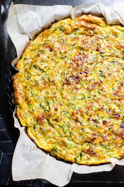 This Crustless Zucchini Quiche recipe creates a quiche that practically melts in the mouth with a light, creamy texture and a nutritious filling that's absolutely packed with zucchini and just enough cheese for a pop of flavor! Enjoy a slice of this crustless zucchini pie warm, at room temperature, or chilled as a snack or part of a larger meal this summer! Crustless Zucchini Quiche, Zucchini Quiche Recipes, Zucchini Quiche, Zucchini Pie, Zucchini Recipes Healthy, Healthy Zucchini, Easy Zucchini, Breakfast Meal, Quiche Recipe