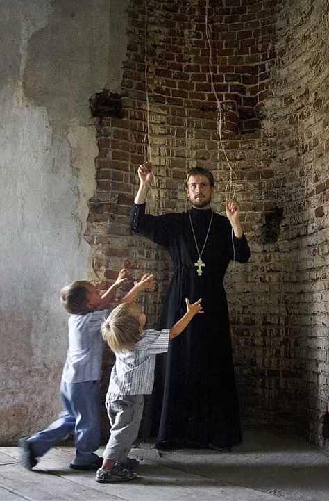 Priest Sergei Smirnov in one of the rural churches in Voronezh region. His sons come running at the sound of the church bells. As a schoolboy and a student of economics, Father Sergei often visited monasteries with his father. These trips, plus the contact he had with the monks, influenced Sergei's decision to enter the Voronezh Orthodox Theological Seminary after graduation. He is presently a member of the clergy of the Voronezh diocese. Byzantine Catholic, Eastern Orthodox Church, Major Tom, Catholic Priest, Holy Father, Eastern Orthodox, Orthodox Christianity, Orthodox Church, Greek Orthodox