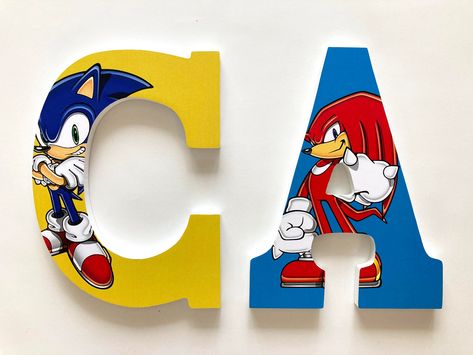 "The price shown is for one 9\" high letter. To order a name, add the number of letters in the name you want to your cart and proceed with check out.  Pick your child's favourite characters: ★ Sonic ★ Tails ★ Knuckles ★ Mighty ★ Shadow and more!  ♡ A preview of your personalized name will be provided within 3 days ♡ Request your own background custom colours ♡ Easy to hang (built-in keyhole in back for nail/pushpin) You will receive a preview of your letters before I start creating them. See wha Sonic Bedroom Ideas Diy, Sonic Bedroom Ideas, Sonic Room, Sonic Bedroom, Hedgehog Room, Sonic Tails Knuckles, Spiderman Room Decor, Spiderman Room, Bedroom Birthday