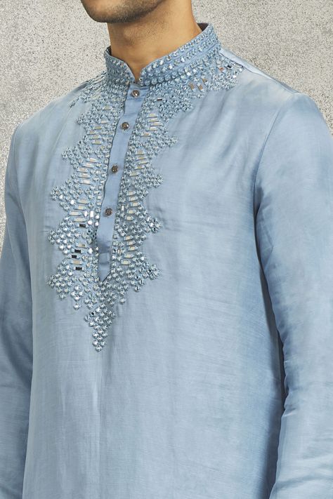 Blue kurta with mirror embroidered placket, collar and hem. Comes with white churidar. Components: 2 Pattern: Embroidered Type Of Work: Mirror Neckline: Mandarin Sleeve Type: Full Fabric: Linen Satin Color: Blue Other Details:  Kurta closure: Front placket Occasion: Sangeet - Aza Fashions Mirror Work Kurta, Kurta Set Men, White Churidar, Groom Dress Men, Gents Kurta, Blue Kurta, Kurta Set For Men, Dress Men, Mens Kurta