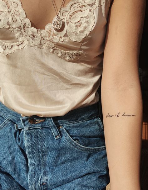 Lower Arm Word Tattoos For Women, Arm Tattoos For Women Script, Take It Slow Tattoo, Slow Down Tattoo Ideas, Arm Script Tattoos For Women, Leader Of The Landslide, Script Tattoo Arm, Slow Tattoo, Slow Down Tattoo