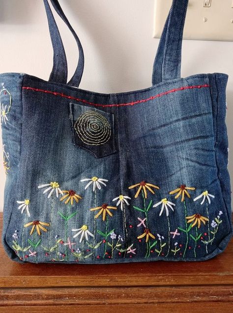 Denim Upcyclers | Purse I embroidered for summer...and a little bag to go with it | Facebook Embroidery On Denim Bags, Embroidery On Denim, Denim Embroidery, Denim Bags, Denim Crafts, Jeans Bag, Tote Bag Pattern, Denim Bag, Flower Embroidery