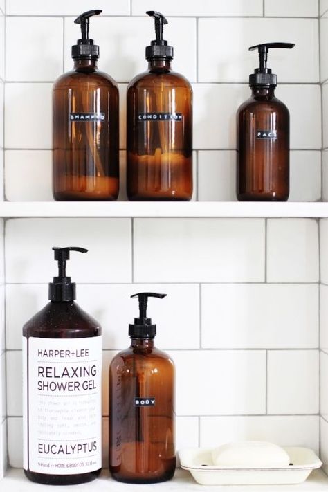 change your ugly shampoo bottles etc for simple neutral containers and bottles for a luxury spa feel; pinned by My Home and Yours blog Shampoo Bottle Diy, Dc Apartment, Fall Bathroom Decor, Farmhouse Apartment, Cheap Bathroom Remodel, Fall Bathroom, Tub Time, Bottle Diy, Brown Bottles