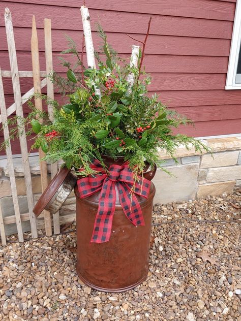 Antique Milk Can from the Buffalo Nickel Antique Barn in Minnesota. Filled with Birch, Cedar, Holly and Boxwood with a Buffalo Plaid Bow. Christmas Milk Can, Antique Milk Can, Porch Pots, Winter Decorating, Cabin Christmas, Buffalo Nickel, Milk Cans, Xmas Ideas, Plaid Bow