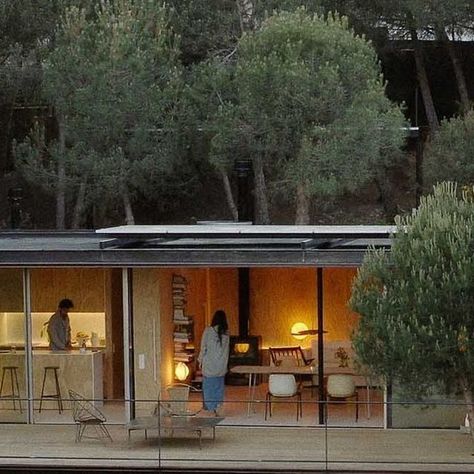 International publisher for architecture on Instagram: "House in Madrid (ES) by @delavegacanolasso: For this single-family dwelling in a steep forested area, the architects went with a partly prefabricated construction of steel modules that protrude dramatically over the slope. The objectives determined by the architects themselves were to sacrifice none of the pines or holm oaks growing on the lot, and to alter the topography as little as possible. Two modules are home to the two bedrooms and their respective bathrooms. Three further, connected modules accommodate the large cooking, dining and living room. A sixth, separate component is devoted to a home studio. Find out more on the project on our website www.detail.de photos by @pacomarinphoto . . #detailmagazine #architecturemagazin Brown House, Dining And Living Room, Architecture Magazines, The Pines, House Goals, Madrid Spain, House Inspo, Home Studio, Interior Architecture Design