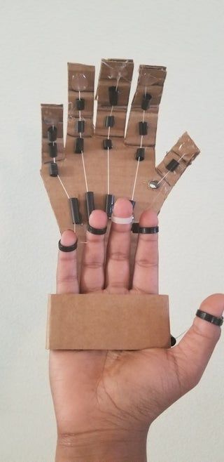 DIY Cardboard Mechanical Hand : 4 Steps - Instructables Diy Engineering Projects, Cardboard Speaker, Cardboard Tutorial, Cosplay Making, Origami Insects, Projek Diy, Cardboard Creations, Glue Stick Crafts, Mechanical Projects