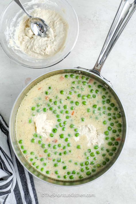 This Bisquick chicken and dumplings recipe makes a quick and comforting dinner. Featuring tender chicken, peas, and carrots simmered in a creamy broth and topped with fluffy Bisquick dumplings, this dish is packed with flavor and comes together in no time. It's ideal for busy weeknights or a cozy weekend meal, sure to please everyone at the table. Simple to prepare and even simpler to enjoy! #theshortcutkitchen Bisquick Chicken And Dumplings, Homemade Ranch Mix, Easy Chicken Dumpling Recipes, Bisquick Dumplings, Peach Cobbler With Bisquick, Bisquick Chicken, Chicken Peas, Dumpling Recipes, Chicken Dumpling