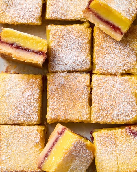 An overhead view of cranberry lemon bar squares cut and angled to see the tops and sides Cranberry Lemon Bars, Dessert Bars Recipes, Cranberry Squares, Cranberry Bars Recipe, Homestyle Meals, Lemon Crumble, Lemon Cranberry, Classic Lemon Bars, Shortbread Cookie Crust