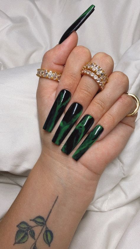 As stunning as Shego herself, whether you use these to be her for Halloween or just want to be as bomb as her on the daily, this set will leave you feeling as confident as ever! Shown in XL square Nail glue included Prep kit sold separately Emerald Green Fall Nails, Emerald Green Nails Acrylic Coffin Long, Black And Sage Green Nails, Shego Inspired Nails, Edgy Nails Grunge Coffin, Xl Press On Nails, New Nail Trend 2024, St Patricks Day Nails Acrylic Coffin, Black And Green Nails Coffin