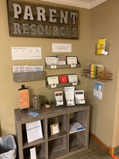 Parent Resource Room Schools Ideas, Front Office Decor Reception Areas For School, Daycare Front Office Ideas, Daycare Center Room Ideas, Ministry Office Design, Pastoral Office Ideas, Childcare Lobby Ideas, Church Welcome Tables, High School Office Bulletin Board Ideas