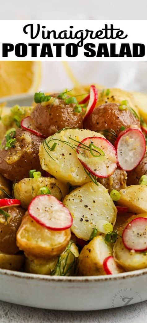 A tangy lemon, oil, and red wine vinegar dressing brings this Lemon Vinaigrette Potato Salad to life. Everyone will rave about this fresh and zesty potato salad. #ourzestylife #vinaigrettepotatosalad #lemonvinaigrettepotatosalad #sidedish #recipe #vinaigrette #lemon #dressing #warm #herb #cold #bbq #withlemondressing #vinaigrettedressing #easydressing Potato Salad Recipe With Vinegar, Vinegar Potato Salad, Herbed Potato Salad, Red Potato Salad Recipe, Potato Salad With Apples, Roasted Potato Salads, Potato Salad Dressing, Zesty Salad, Warm Potato Salads