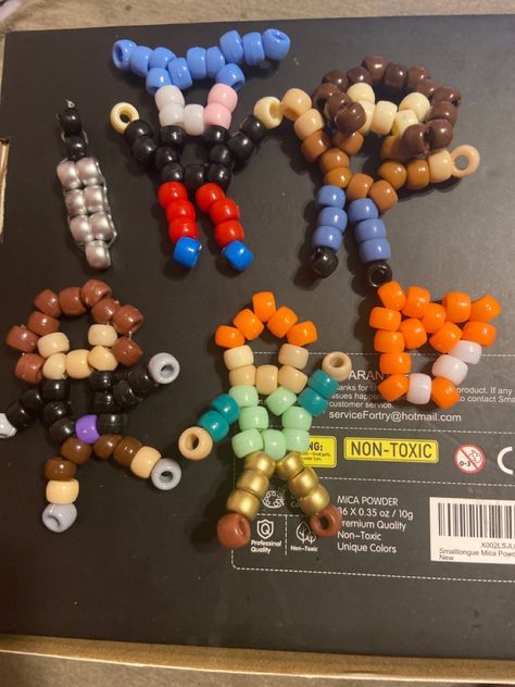 Kandi Mushroom Tutorial, Unique Kandi Ideas, Kandi Patterns Templates With Numbers, Sally Face Kandi, Kandi Necklace Ideas, Mario Kandi, Kandi Singles Ideas, Kandi Charms, Kandi Inspiration